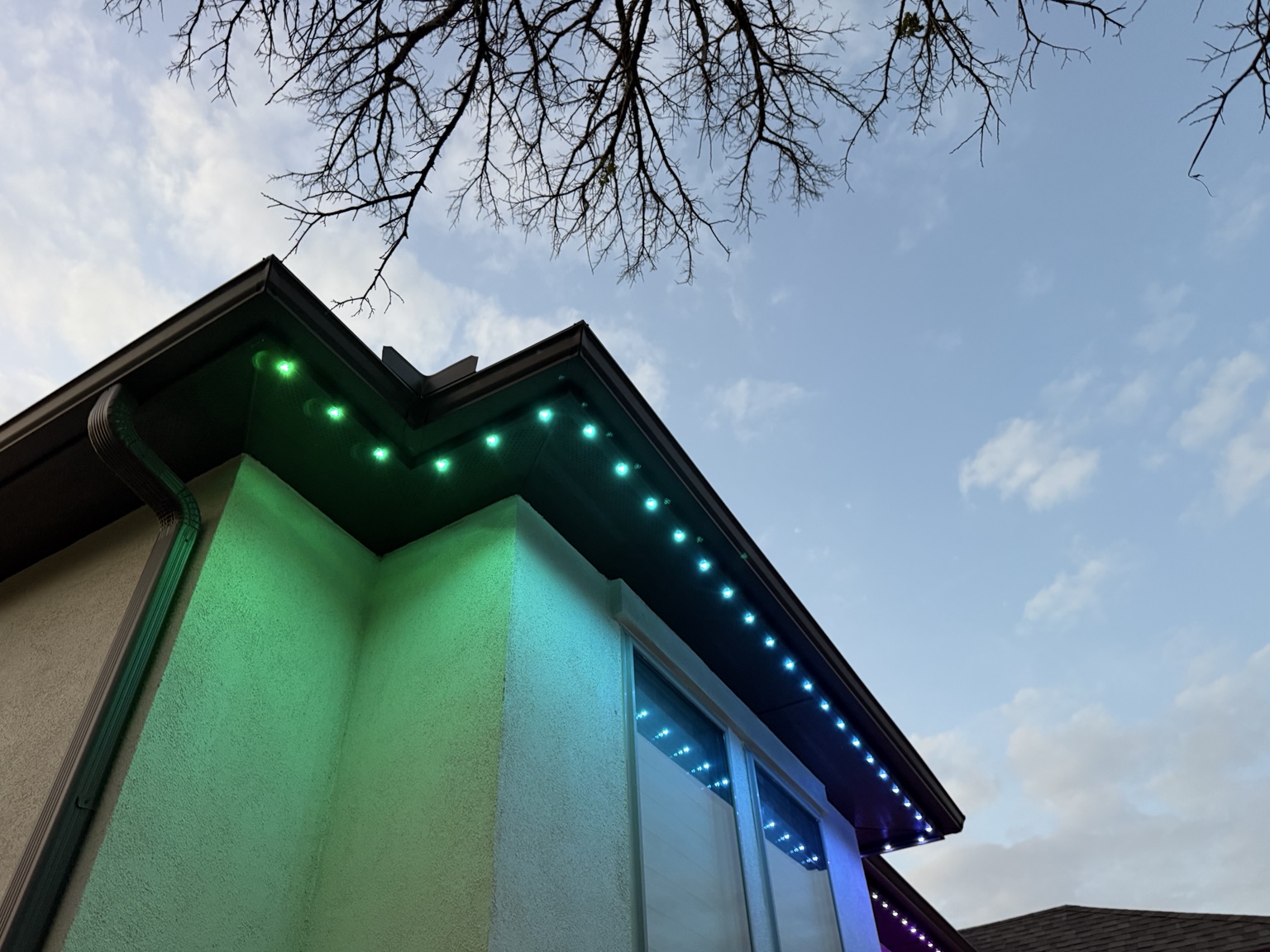 Individual Puck Lights installed beneath a roofline